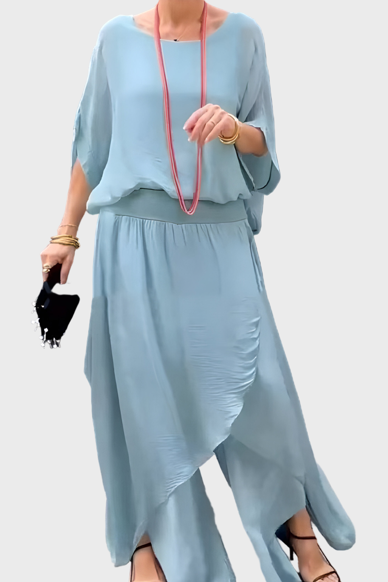 Plačios viršutinės dalies ir suplėšytos kelnės – dviejų dalių sijonas iš šifono